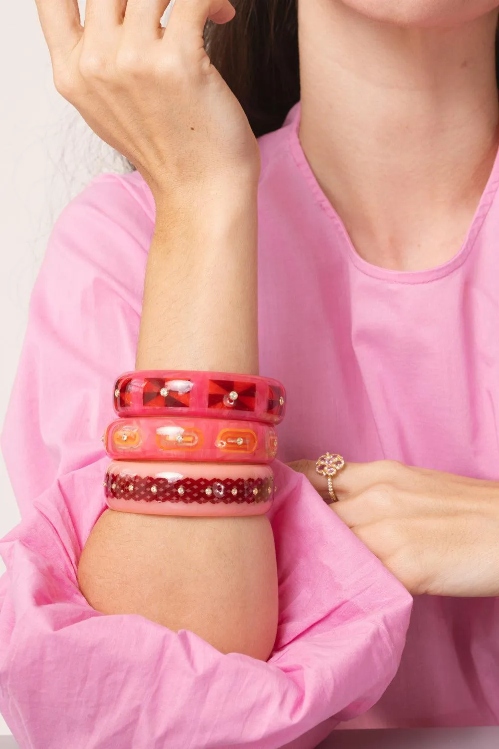 White Topaz Pink Yellow Bakelite Bangle